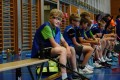 Glückliche Teilnehmer auf der Spielerbank